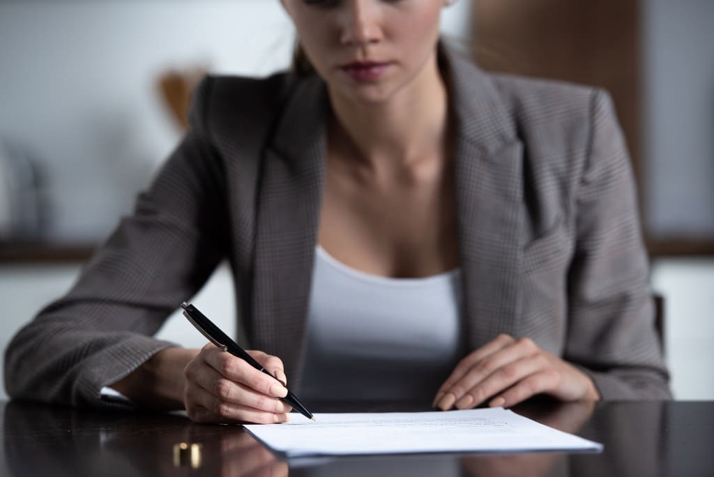 Client Signing The Legal Doc