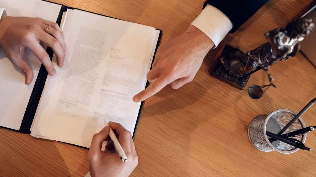 Lawyer Guiding His Client Through The Process