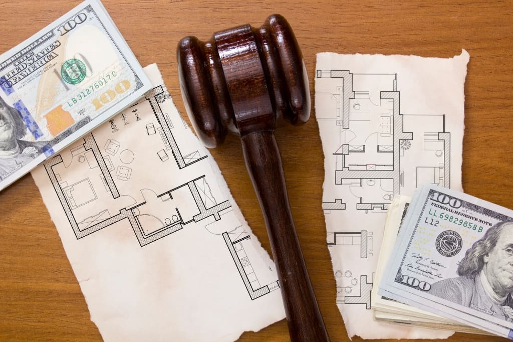 Legal Gavel Tearing Image Of The House