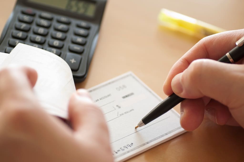 Client Signing The Legal Check