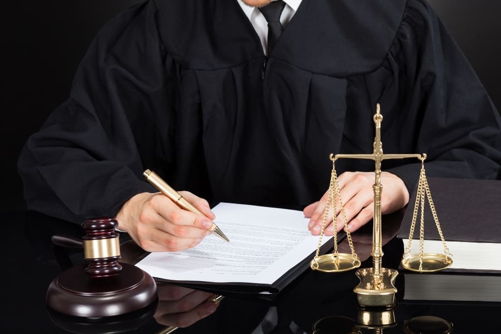 Judge Signing The Legal Doc